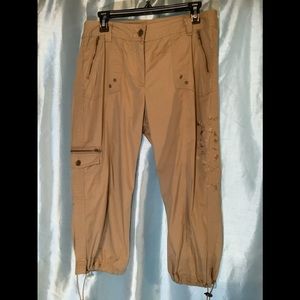 Beige Capris with embroidery on leg, lots of pockets, drawstrings on bottom, NWT